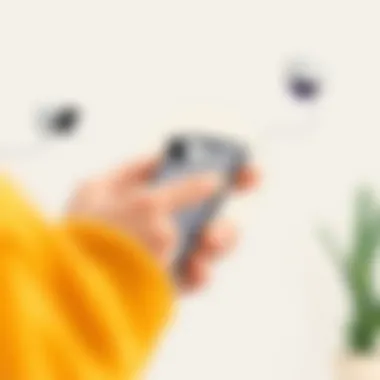 A user interacting with a security camera app on a smartphone