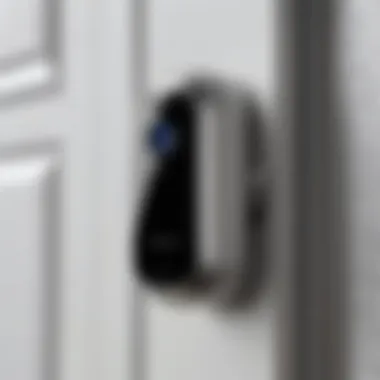 Close-up view of a sleek doorbell camera integrated with HomeKit