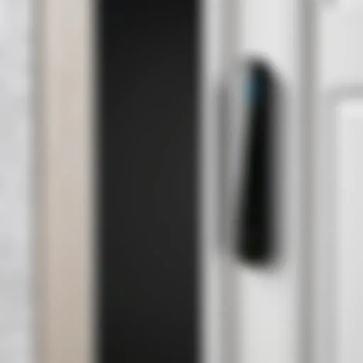 Wireless door sensor mounted on a modern door frame